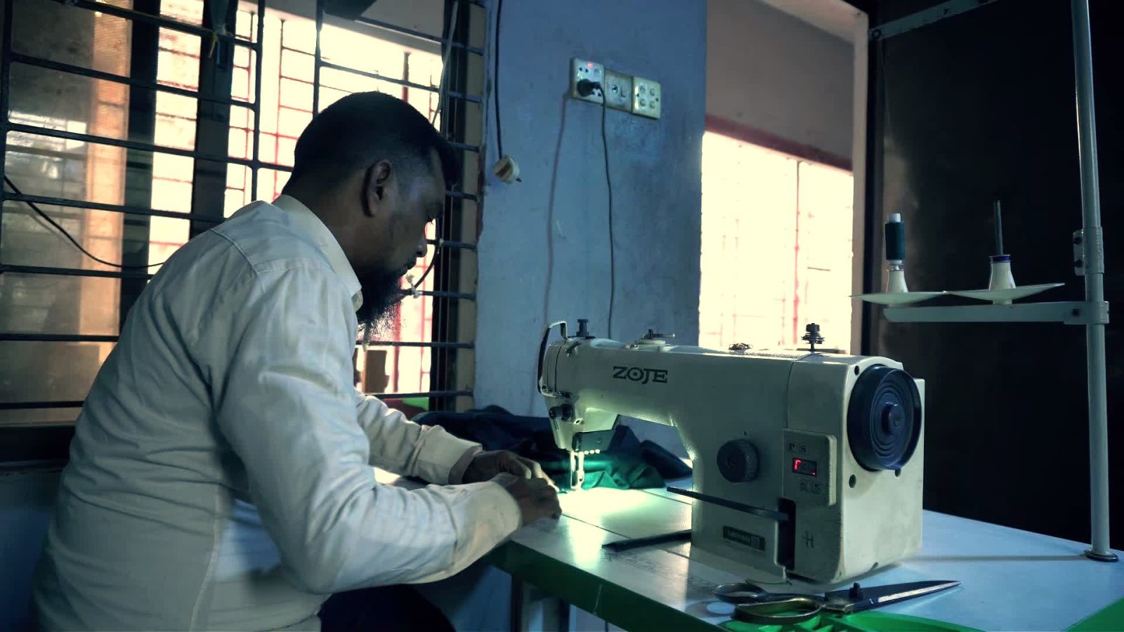 Yunus Sharif — Back at his machine